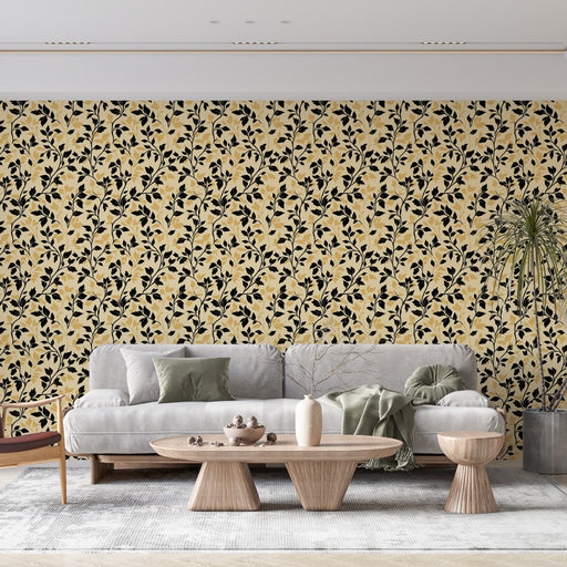 Un salon moderne avec un papier peint floral jaune et noir aux motifs élégants, créant une ambiance chaleureuse et accueillante.