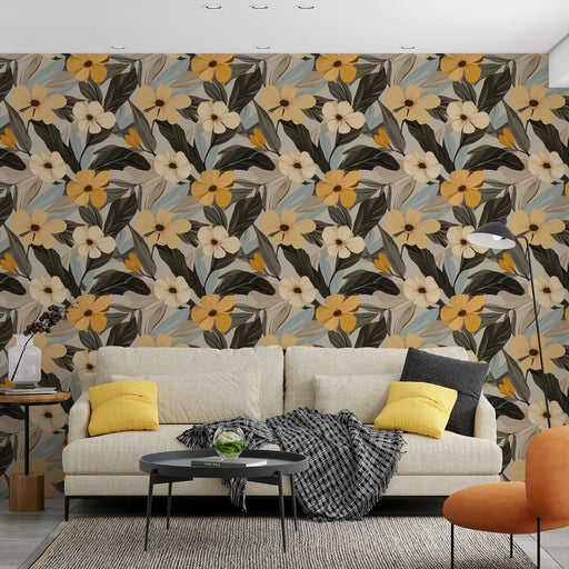 Un salon contemporain avec un papier peint floral aux grandes fleurs jaunes et blanches sur fond beige, créant une ambiance chaleureuse et accueillante.