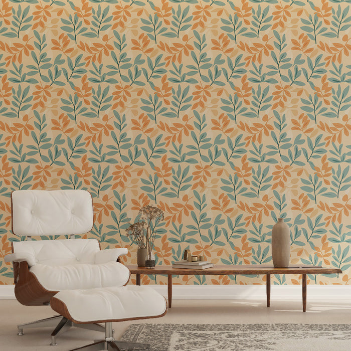 Une pièce moderne avec un papier peint floral aux motifs de feuilles orange et turquoise sur fond beige, créant une atmosphère chaleureuse et accueillante.