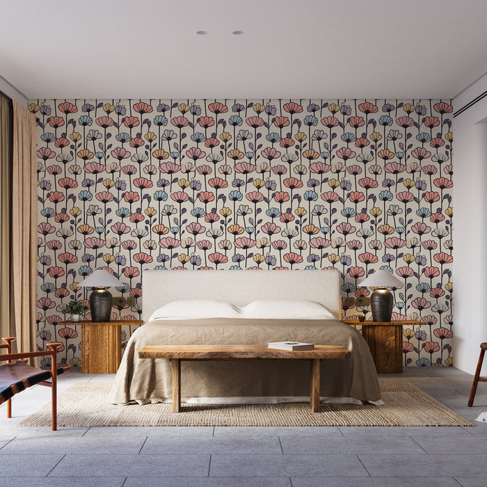 Une chambre moderne avec un papier peint floral aux motifs colorés et délicats sur fond clair, créant une ambiance chaleureuse et accueillante.