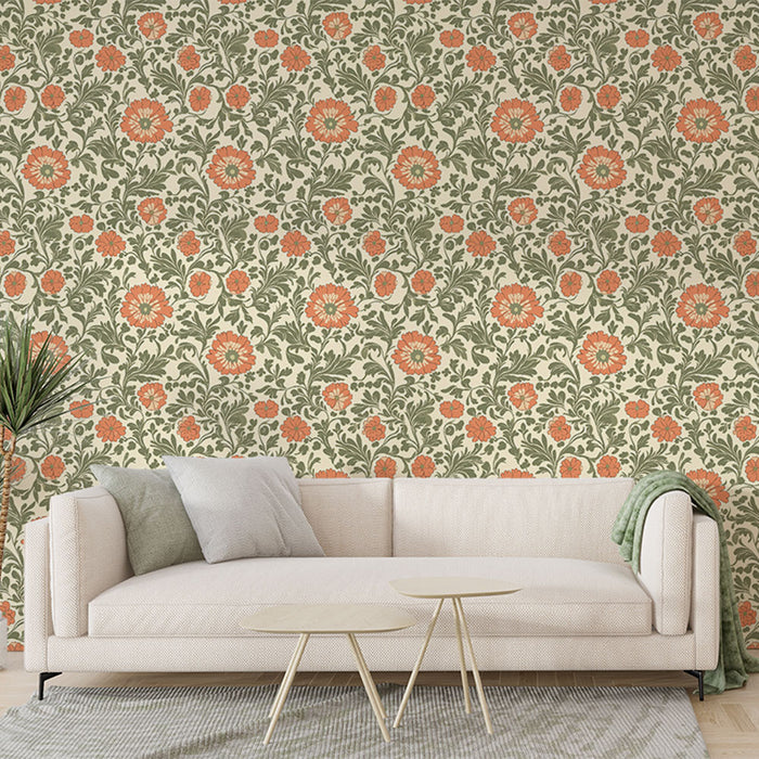 Un salon lumineux avec un papier peint floral aux motifs de grandes fleurs orange sur fond crème, créant une ambiance chaleureuse et accueillante.