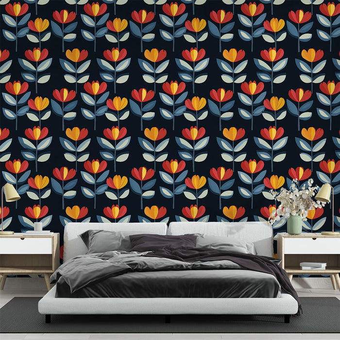 Une chambre moderne avec un papier peint floral aux motifs colorés de fleurs rouges, oranges et bleues sur fond noir, créant une atmosphère chaleureuse et accueillante.