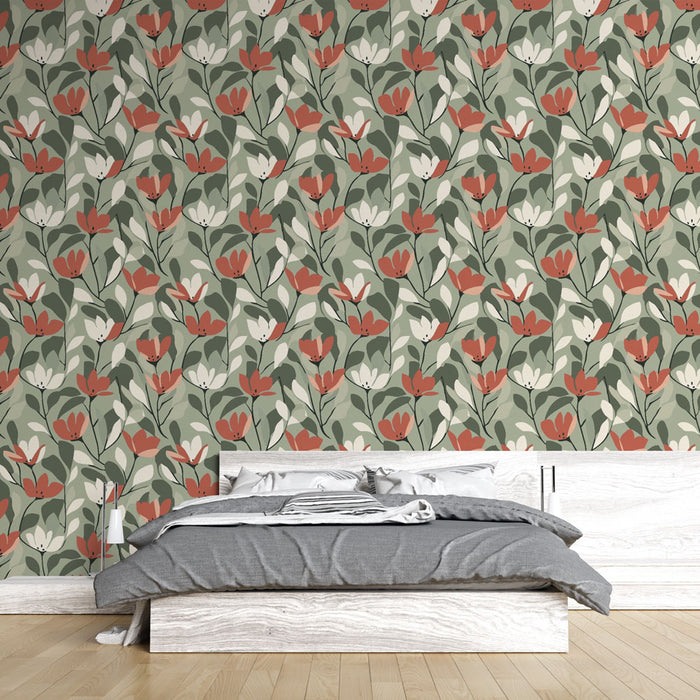 Une chambre moderne avec un papier peint floral aux motifs de fleurs rouges et blanches sur fond vert, créant une ambiance chaleureuse et accueillante.