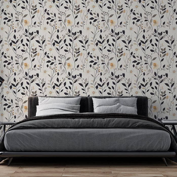 Une chambre moderne avec un papier peint floral aux motifs délicats de feuilles noires et fleurs dorées sur fond clair, créant une ambiance douce et apaisante.