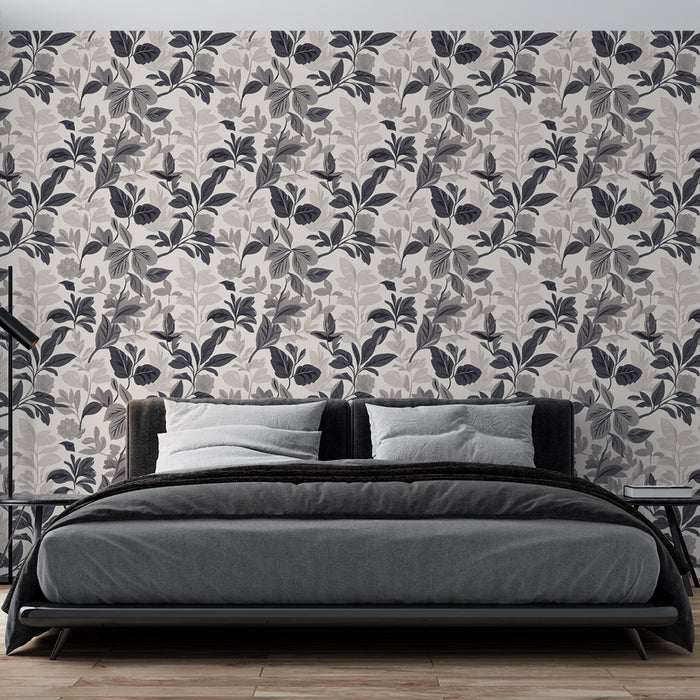Une chambre moderne avec un papier peint floral aux teintes grises et noires sur fond clair, créant une atmosphère élégante et apaisante.