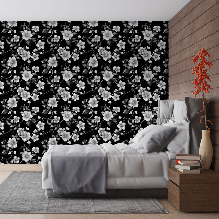 Une chambre élégante avec un papier peint floral noir et blanc, aux motifs délicats de fleurs, créant une atmosphère chic et apaisante.