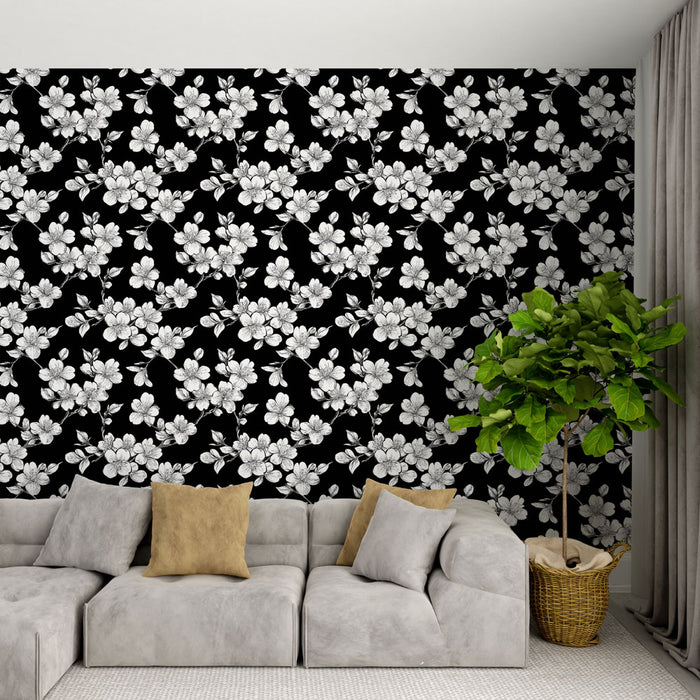 Un salon moderne avec un papier peint floral noir et blanc, aux motifs délicats de fleurs, créant une ambiance élégante et contemporaine.