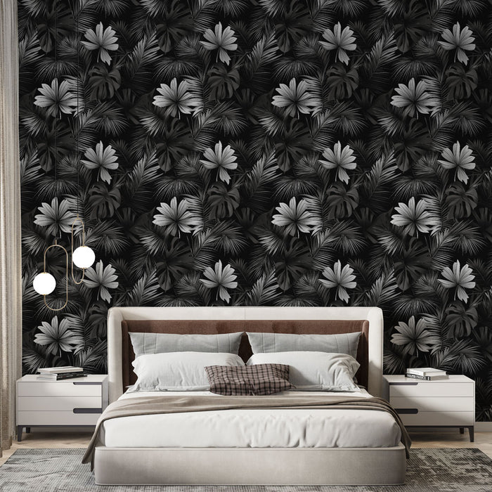 Une chambre moderne avec un papier peint tropical noir et blanc, présentant des feuilles exotiques et des fleurs stylisées, créant une ambiance élégante et sophistiquée.