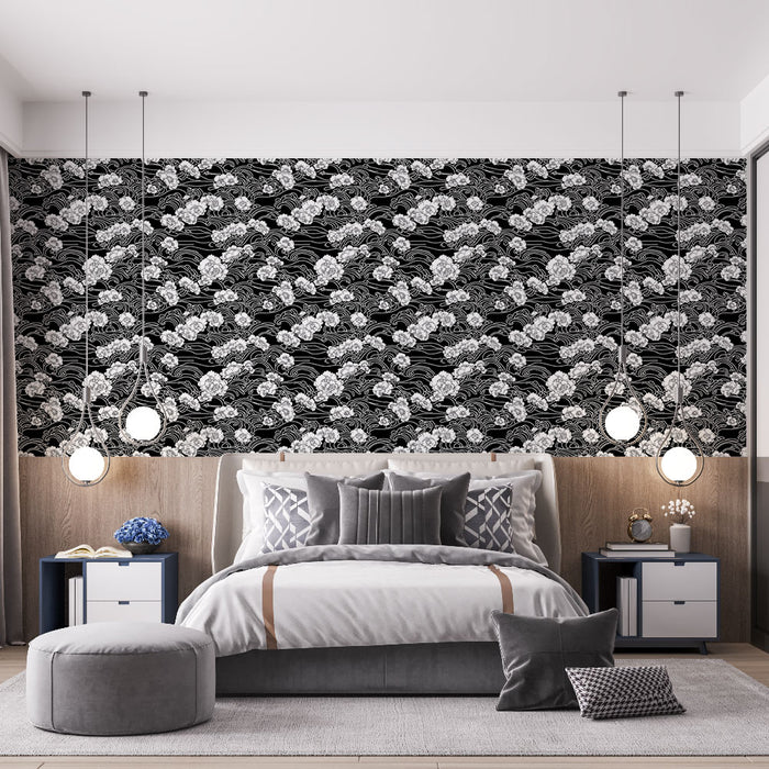 Une chambre moderne avec un papier peint floral noir et blanc illustrant des motifs de fleurs stylisées sur un fond sombre, créant une atmosphère élégante et contemporaine.