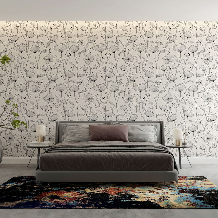 Une chambre moderne avec un papier peint floral noir et blanc aux motifs délicats, créant une atmosphère apaisante et élégante.