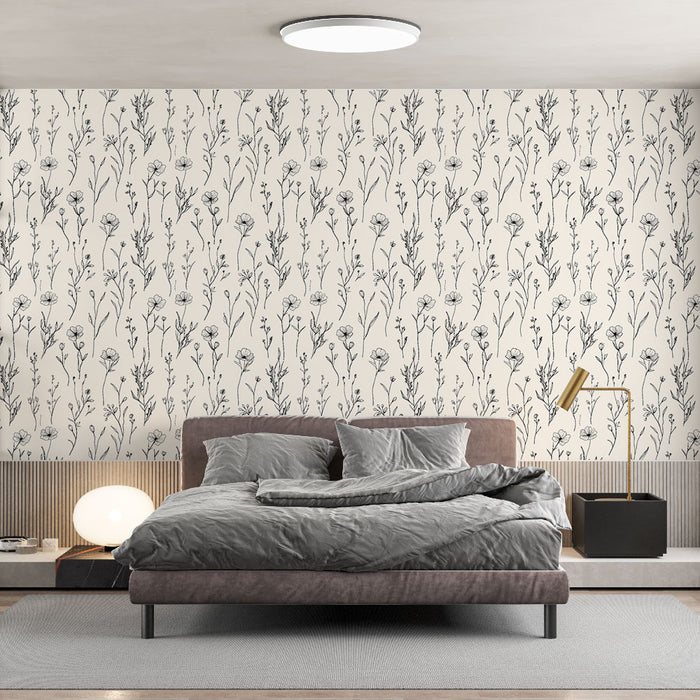 Une chambre moderne avec un papier peint floral noir et blanc représentant des motifs délicats sur fond crème, créant une atmosphère apaisante et élégante.