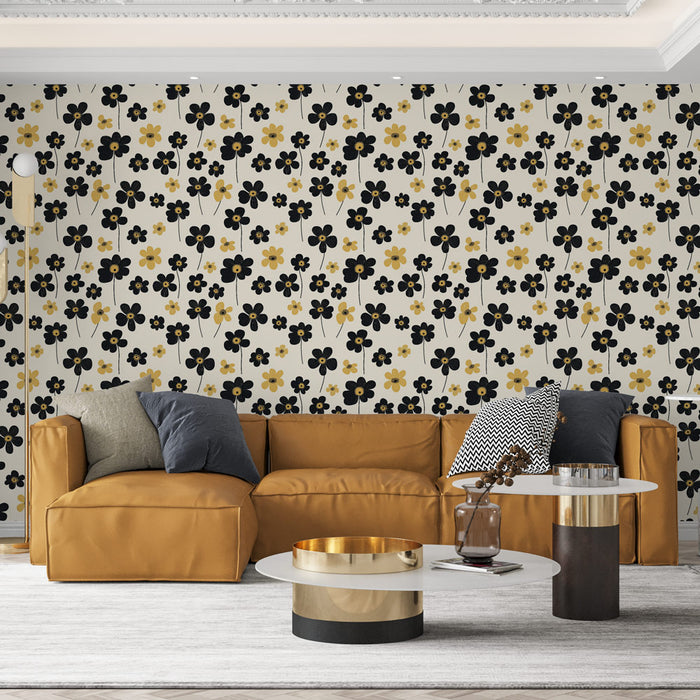 Un salon contemporain avec un papier peint floral aux motifs noirs et jaunes sur fond clair, créant une ambiance joyeuse et dynamique.