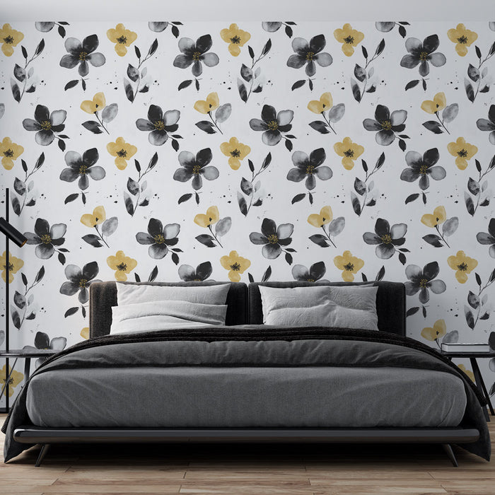 Une chambre moderne avec un papier peint floral noir et jaune sur fond blanc, créant une ambiance à la fois élégante et chaleureuse.