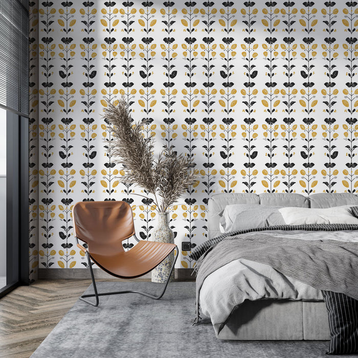Une chambre moderne avec un papier peint floral noir et jaune sur fond blanc, créant une ambiance joyeuse et accueillante.