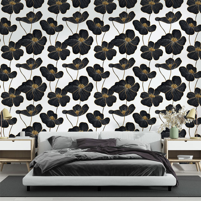 Une chambre élégante avec un papier peint floral noir et doré sur fond blanc, créant une atmosphère chic et sophistiquée.
