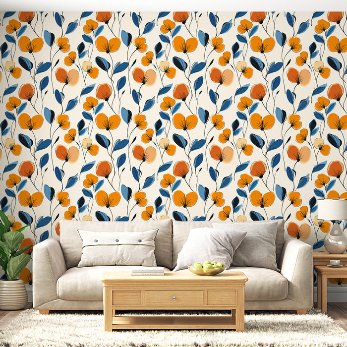 Un salon lumineux avec un papier peint floral aux motifs orange et bleu sur fond crème, créant une ambiance chaleureuse et accueillante.