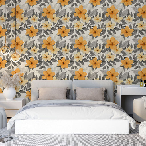 Une chambre moderne avec un papier peint floral aux motifs de grandes fleurs jaunes et blanches sur fond clair, créant une atmosphère chaleureuse et accueillante.