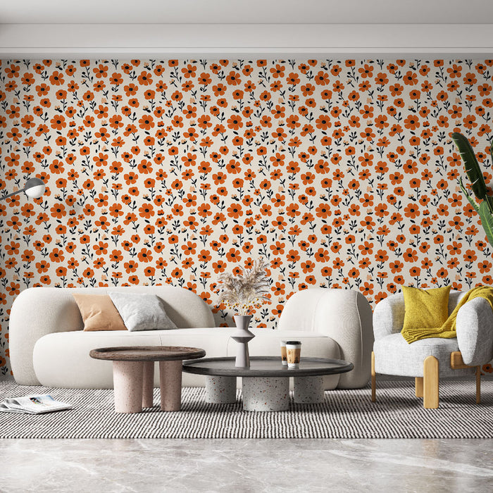 Un salon contemporain avec un papier peint floral aux motifs orange et noirs sur fond clair, créant une atmosphère chaleureuse et accueillante.