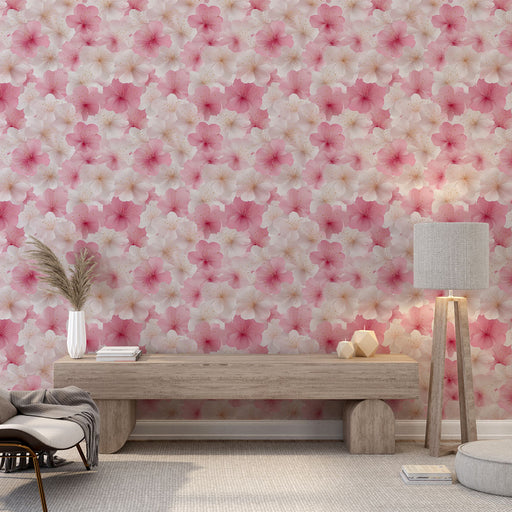 Une pièce lumineuse avec un papier peint floral aux nuances de rose et blanc, créant une atmosphère douce et romantique.