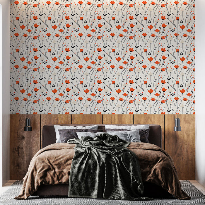 Une chambre élégante avec un papier peint floral aux motifs de fleurs rouges et noires sur fond clair, créant une ambiance chaleureuse et accueillante.