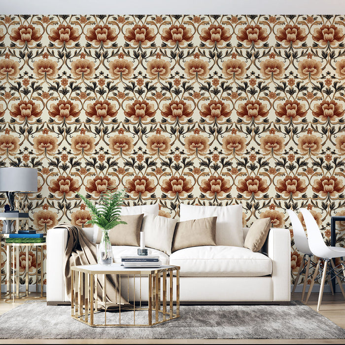 Un salon élégant avec un papier peint floral aux teintes chaudes de rouge et beige, créant une ambiance chaleureuse et accueillante.