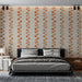 Une chambre moderne avec un papier peint floral aux motifs orange et beige sur fond clair, créant une ambiance chaleureuse et accueillante.
