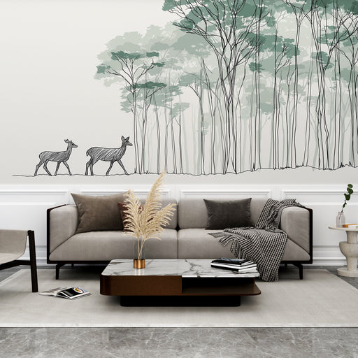 Une pièce moderne avec un papier peint représentant des silhouettes de cerfs et d'arbres stylisés dans des teintes douces de vert, créant une ambiance apaisante et naturelle.