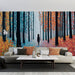 Un salon contemporain avec un papier peint illustrant une forêt automnale colorée, mêlant des teintes vives de bleu, orange et rouge, créant une atmosphère poétique et rêveuse.