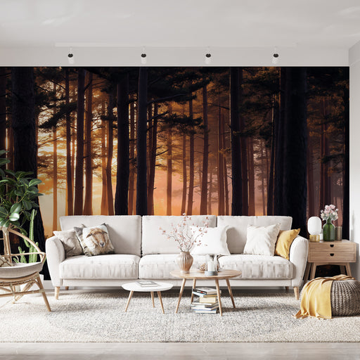 Un salon contemporain avec un papier peint représentant une forêt au coucher de soleil, créant une ambiance chaleureuse et apaisante.