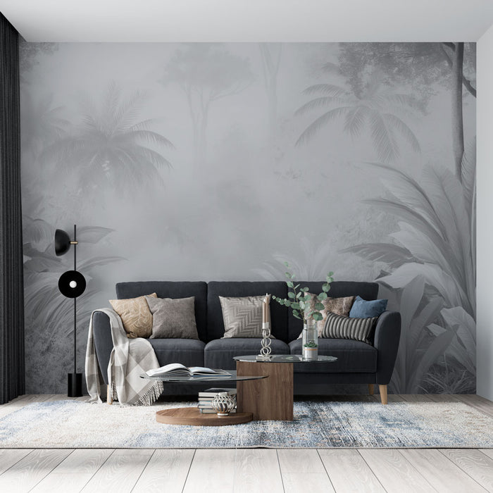 Un salon contemporain avec un papier peint tropical en nuances de gris représentant des feuillages luxuriants, créant une atmosphère apaisante et élégante.
