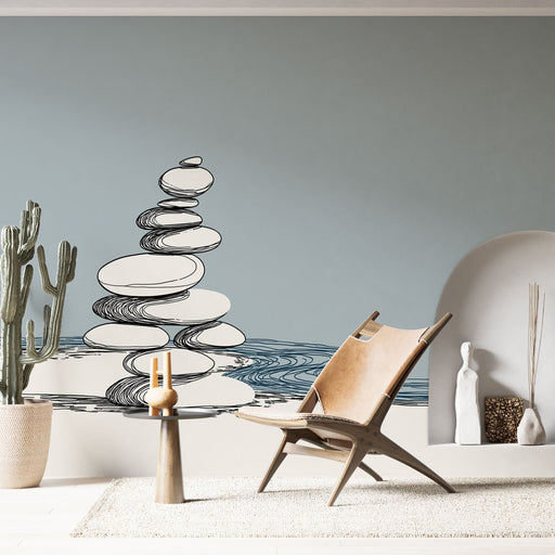 Une pièce moderne avec un papier peint représentant des galets stylisés en noir sur fond bleu apaisant, créant une atmosphère zen et sereine.