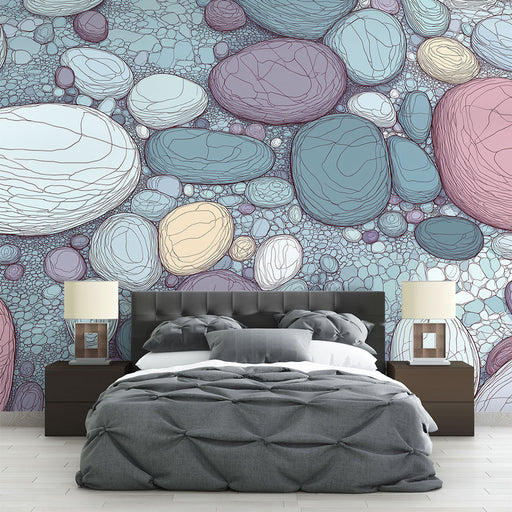 Une chambre moderne avec un papier peint représentant des galets aux teintes pastel et aux contours délicats, créant une ambiance apaisante et naturelle.