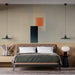 Papier peint géométrique avec formes abstraites dans des tons doux pour chambre moderne.