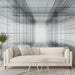 Papier peint géométrique avec lignes en perspective créant une illusion d'espace pour salon moderne
