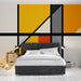 Papier peint géométrique coloré avec blocs et lignes noires pour chambre moderne