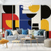 Papier peint géométrique avec motifs colorés et abstraits en noir, rouge, jaune et bleu pour salon moderne.