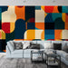 Papier peint géométrique coloré avec motifs modernes et formes abstraites pour salon contemporain.