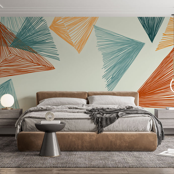 Une chambre moderne avec un papier peint graphique aux formes géométriques en bleu, orange et beige, créant une ambiance dynamique et chaleureuse.
