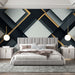 Papier peint géométrique avec motifs en relief noir et doré pour chambre moderne.