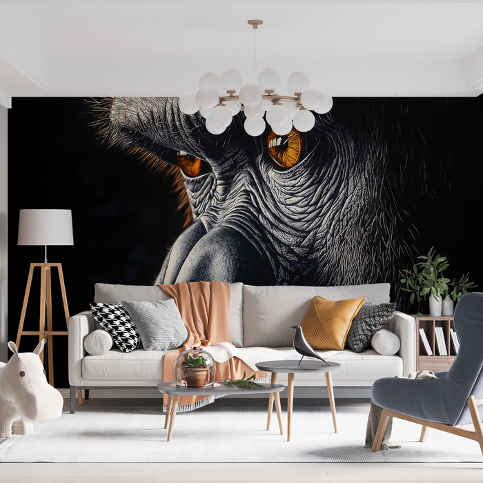 Un salon moderne avec un papier peint représentant un gorille aux yeux orange perçants sur fond noir, créant une ambiance à la fois captivante et audacieuse.