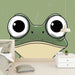 Papier peint vert avec illustration amusante de grenouille aux grands yeux pour chambre enfant