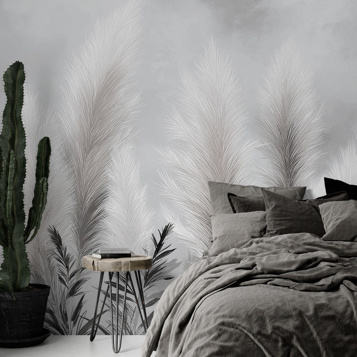 Une chambre moderne avec un papier peint représentant de grandes plumes délicates dans des teintes grises, créant une atmosphère apaisante et élégante.