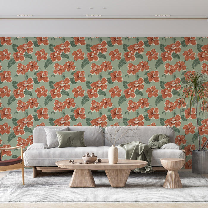 Un salon moderne avec un papier peint floral aux grandes fleurs orange sur fond vert, créant une ambiance chaleureuse et tropicale.