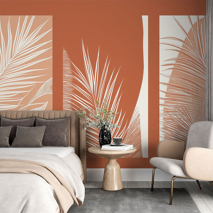 Une chambre moderne avec un papier peint terracotta orné de grandes feuilles blanches, créant une ambiance chaleureuse et tropicale.