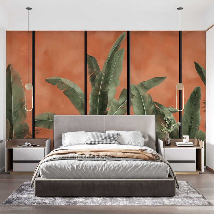 Une chambre moderne avec un papier peint aux grandes feuilles tropicales sur fond terracotta, créant une atmosphère chaleureuse et accueillante.