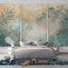 Une chambre moderne avec un papier peint tropical aux teintes douces de vert et or, évoquant une ambiance apaisante et naturelle.