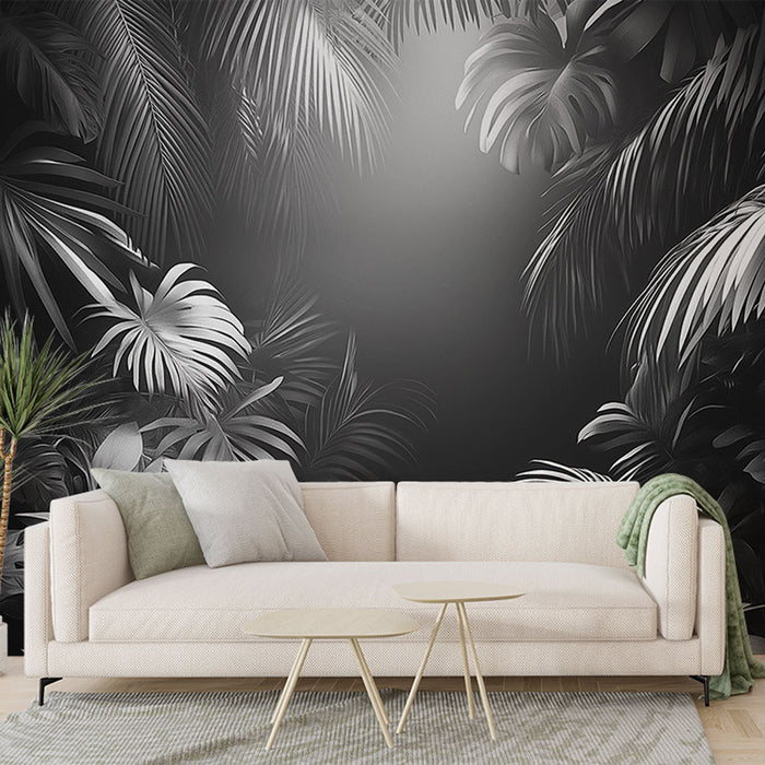 Un salon contemporain avec un papier peint tropical noir et blanc représentant des feuilles de palmier, créant une ambiance élégante et apaisante.