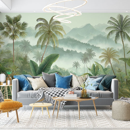 Un salon lumineux avec un papier peint tropical représentant une jungle luxuriante aux teintes vertes et bleutées, créant une atmosphère apaisante et naturelle.