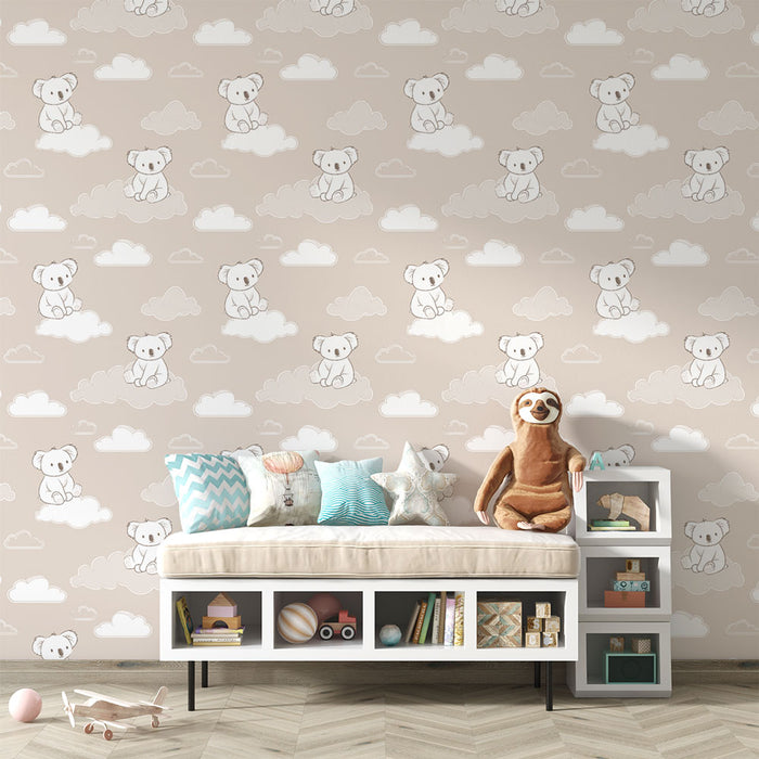 Une chambre d'enfant avec un papier peint doux représentant des ours en peluche sur des nuages, créant une atmosphère chaleureuse et ludique.