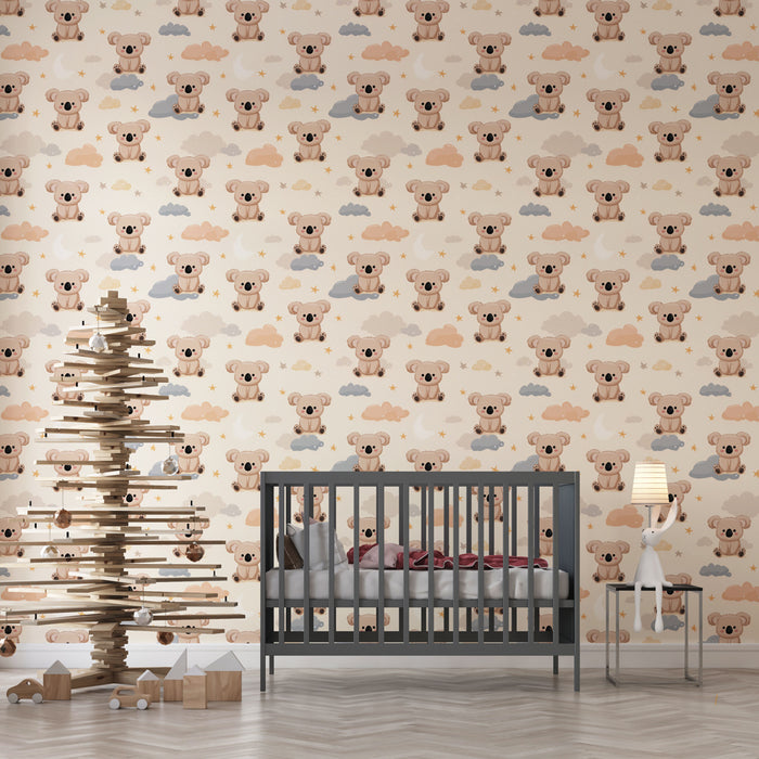 Une chambre d'enfant avec un papier peint ludique représentant des koalas sur fond clair, créant une atmosphère douce et réconfortante.